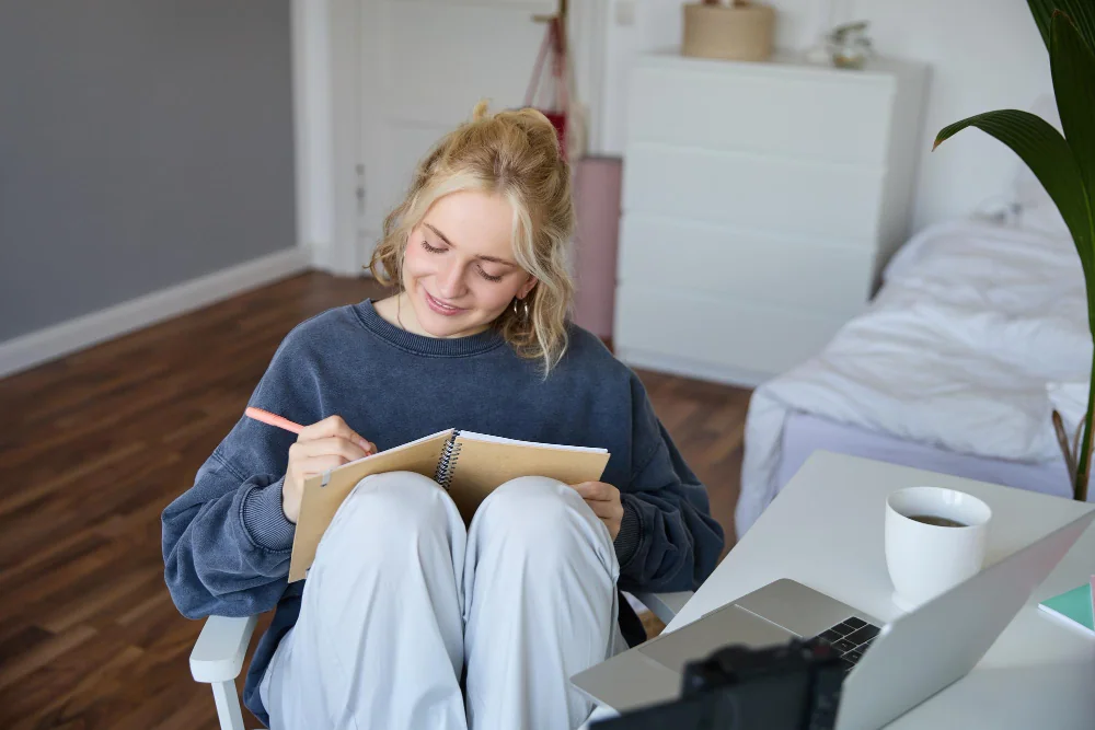 Woman journaling at home